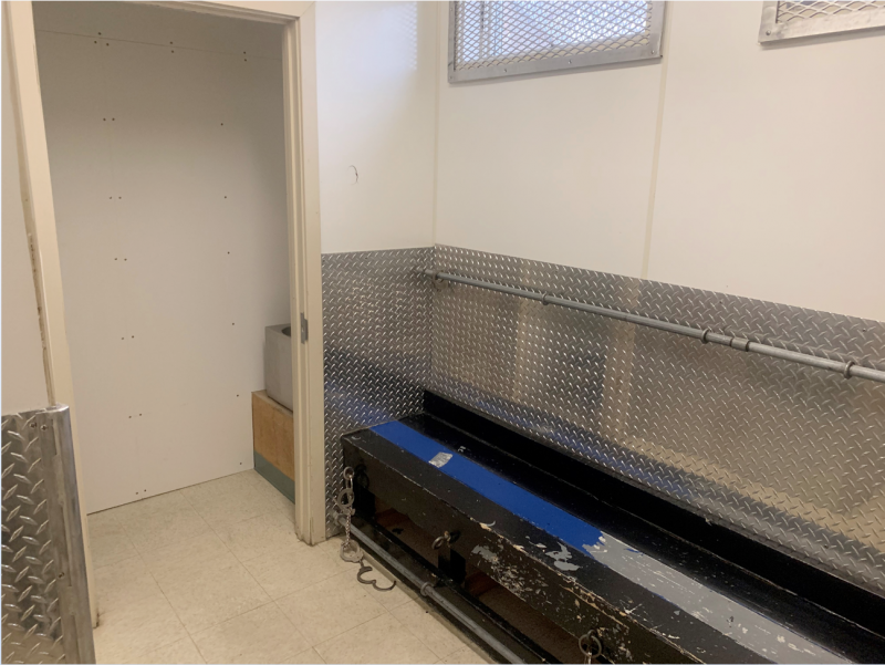 Only one holding cell exists for male, female and juvenile detainees. The wall at far left has been restored after a suspect escaped detention in 2018 by breaking through it. SUBMITTED PHOTO